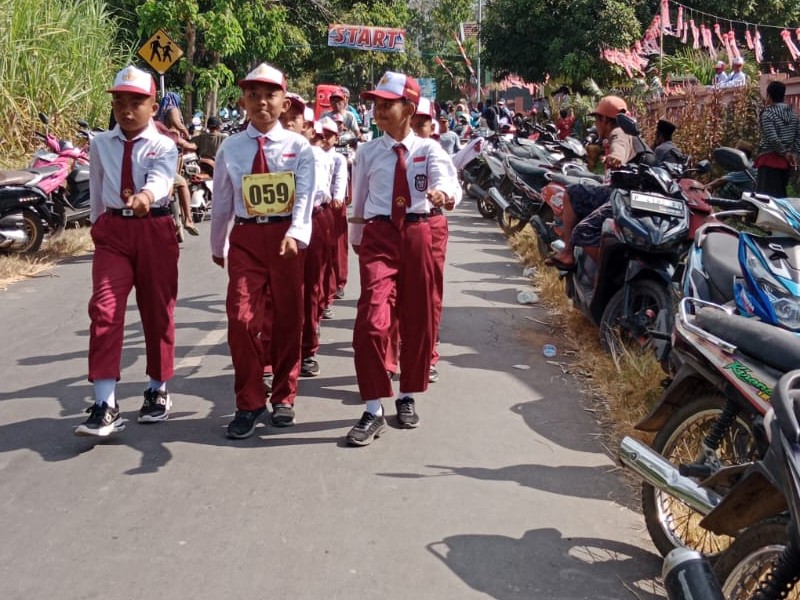 "Wujud Cinta Tanah Air, SDN 5 Arjasa Turut Serta dalam Lomba Gerak Jalan"